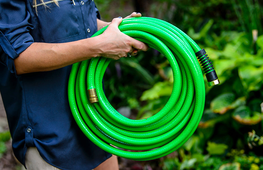 Garden Hose Reel on Dry Grass Stock Photo - Image of agriculture
