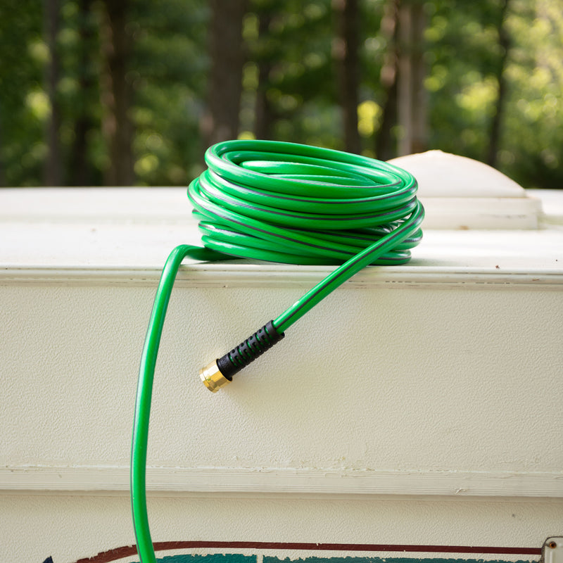 Green Element UltraLITE hose on top of a trailer